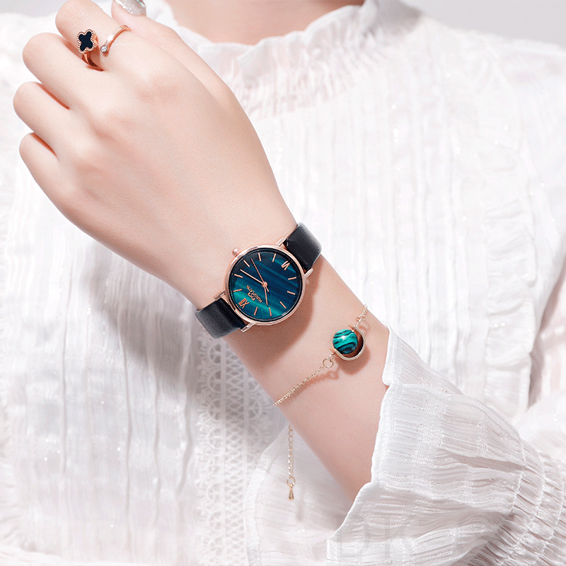 ファッションレトロ防水深度30ｍ合成皮革クォーツ時計リトルニードル配色縁取りラウンド合金腕時計